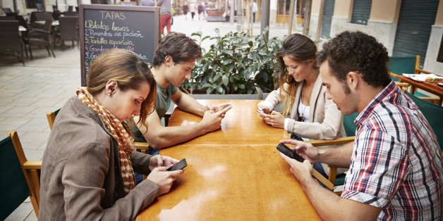 Anti-social teenagers on phones